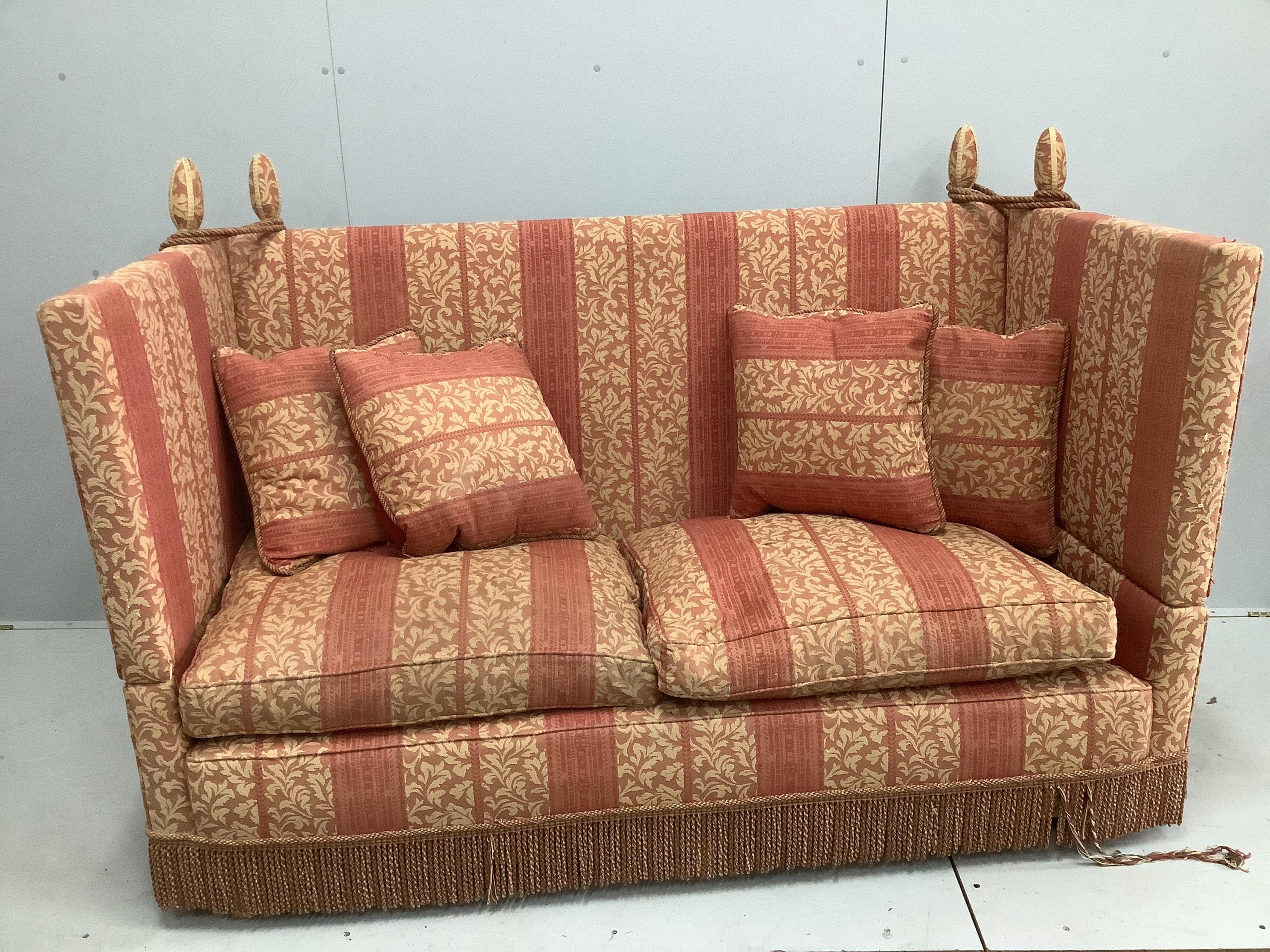 A Knole two seater settee, width 178cm, depth 84cm, height 118cm. Condition - fair